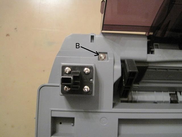 http://www.nifty-stuff.com/forum/uploads/1315_mp760_upper_left_rear_screw.jpg