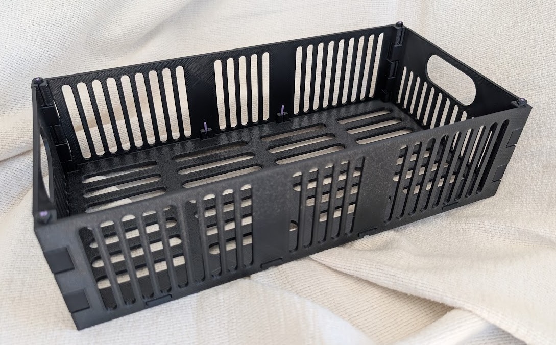 Assembled black flat-pack filament-lock crate